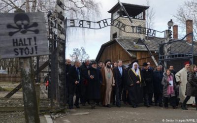 Muslim and Jewish leaders stand together in solidarity at Auschwitz